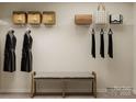 Organized walk-in closet with shelving, hanging space, and a comfortable bench at 2107 Columbidae Ln, Gastonia, NC 28052