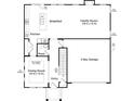 Layout for the first floor featuring a kitchen, living area, dining room, and two-car garage at 110 Canary Ln # 3, Mooresville, NC 28115