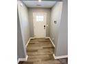 Inviting entryway with wood-look floors and neutral paint that offers a welcoming first impression at 126 Pleasant Hill St, Lancaster, SC 29720