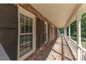 View of the home's porch with brick flooring and white railing at 781 Summerwood Dr, Rock Hill, SC 29732