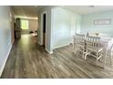 Inviting dining room featuring lovely flooring and ample natural light for a comfortable dining experience at 1070 Glenbriar Ct, Woodleaf, NC 27054