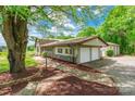 Attached two-car garage with a convenient driveway and well-maintained landscaping at 286 Bell Farm Rd, Statesville, NC 28625