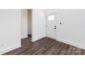 Bright foyer featuring clean white walls, dark floors, and modern fixtures at 3007 West Blvd, Charlotte, NC 28208