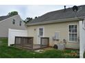 Backyard has a small deck and view of the home's exterior at 428 Lexie Ln # 100, Rock Hill, SC 29732