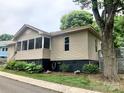 Well-maintained single Gathering home features an inviting exterior with mature trees and beautiful landscaping at 439 17Th St, Cramerton, NC 28032