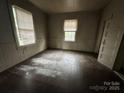 Bright bedroom with natural light coming from two windows at 714 Douglas St, Shelby, NC 28150