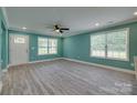 A spacious living room with vinyl floors, recessed lighting, and a ceiling fan at 1495 Memorial Park Rd # 10, Lancaster, SC 29720