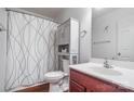 Cozy bathroom featuring vanity, mirror, toilet, shower curtain and cabinet at 1863 New Castle Dr, Fort Mill, SC 29707