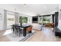 Stylish living area featuring modern decor, large windows, and an open layout at 302 Wesley Heights Way, Charlotte, NC 28208