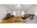 Comfortable living area showcasing hardwood floors, neutral walls, and a spacious layout at 3124 Banks St, Lincolnton, NC 28092