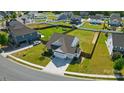 Expansive backyard featuring mature trees, a playground, and a privacy fence at 1116 Brooksland Pl, Waxhaw, NC 28173