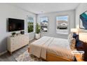 Serene bedroom with natural light, neutral decor, and ample closet space at 11933 Silverheel Ln, Huntersville, NC 28078