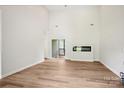 Spacious living room with an electric fireplace and sliding door access to the deck at 205 Sheffield Dr, York, SC 29745