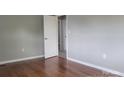Spacious bedroom featuring wood flooring and neutral-colored walls at 2109 Boggs St, Lincolnton, NC 28092