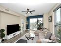 Modern living room featuring stylish furniture, large windows, and contemporary decor at 333 W Trade St # 800, Charlotte, NC 28202