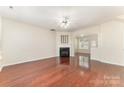 Expansive living room featuring a fireplace and seamless transition to the kitchen at 827 Gentlewinds Ct, Fort Mill, SC 29708