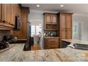 Well-equipped kitchen with granite countertops, custom cabinets, and stainless steel appliances at 20135 Northport Dr, Cornelius, NC 28031