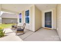 Inviting front porch with rocking chairs, perfect for relaxing and enjoying the neighborhood views at 3029 Trace Meadow Ct, York, SC 29745