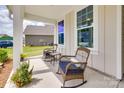 Charming front porch featuring comfortable seating and a welcoming entrance to the home at 3029 Trace Meadow Ct, York, SC 29745