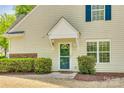 Inviting front entrance with covered porch and manicured landscaping at 5206 Fire Water Ln, Fort Mill, SC 29707