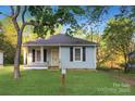 Charming single-story home with a well-maintained lawn and a welcoming front porch at 872 Wellman St, Gastonia, NC 28054