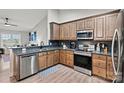 Modern kitchen features stainless appliances, granite countertops, dark backsplash, and ample cabinet space at 3615 Kimber Ln, Sherrills Ford, NC 28673