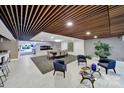 Spacious lobby area with comfortable seating, fireplace and stylish decor at 1323 Queens Rd # 420, Charlotte, NC 28207