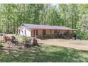 Charming single-story house with a cozy front porch and a welcoming exterior at 212 Davies Cir, Cleveland, NC 27013
