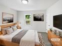 Comfortable bedroom with plush bedding, natural lighting, and modern decor at 269 Bud Black Rd, Crouse, NC 28033