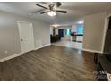 Bright living room boasts wood flooring, neutral paint, and an open floor plan at 440 Mt Moriah Church Rd, China Grove, NC 28023
