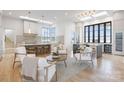 Bright kitchen featuring an island with bar seating and sleek modern design at 8397 Ranger Island Marina Rd, Denver, NC 28037
