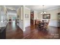 Formal dining area boasts hardwood floors and traditional wainscoting detail at 4016 Garden Oak Dr, Indian Trail, NC 28079