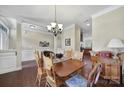 Dining room featuring wood floors, a chandelier, and traditional decor at 4016 Garden Oak Dr, Indian Trail, NC 28079