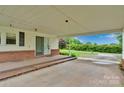 Spacious covered carport featuring a concrete floor, seamless access to the outdoors, and a great view of the street at 543 18Th Nw St, Hickory, NC 28601