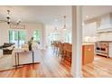 Bright and airy living space seamlessly connects to the kitchen and dining areas, perfect for gatherings at 1030 Little Cowgirl Ln, Cleveland, NC 27013