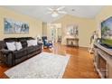 Inviting living room with wood floors, vaulted ceiling, and neutral paint. Cozy furniture arrangement and bright, open feel at 1666 Sam Smith Rd, Fort Mill, SC 29708