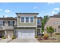 A charming two-story home with a two-car garage and well-maintained landscaping at 2034 Suttonview Rd, Fort Mill, SC 29708