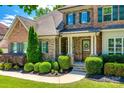 Close up of the front entrance showing the nice front door and landscaping at 618 Chase Ct, Fort Mill, SC 29708