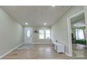 Bright and airy living room with neutral paint and modern flooring at 8140 Karriker Rd, Kannapolis, NC 28081