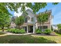 Beautiful brick home with manicured lawn, dark shutters, and a welcoming entrance at 1210 Langdon Terrace Dr, Indian Trail, NC 28079