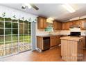 Functional kitchen with ample cabinet space, stainless steel appliances, and a convenient island at 3442 Cedar Circle Rd, Lancaster, SC 29720