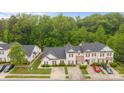 Aerial view of charming homes with well-maintained landscaping and ample parking at 8313 Carob Tree Ln, Charlotte, NC 28215