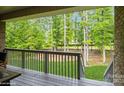 Relaxing backyard view, accessible from deck, offering serene views of wooded landscape at 876 Hardin St # B24, Lancaster, SC 29720