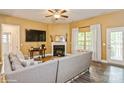 Cozy living room boasts a fireplace, natural light, and comfortable seating at 876 Hardin St # B24, Lancaster, SC 29720