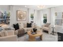 Cozy living room with natural light, stylish furnishings, and a neutral color palette at 1314 Ordermore Ave, Charlotte, NC 28203