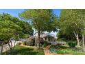 Charming home featuring lush landscaping, covered porch, and an inviting walkway at 273 Leeward Point Loop # 14, Taylorsville, NC 28681