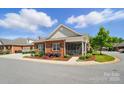 Attractive single-Gathering brick home with a screened in porch in a well-kept neighborhood at 8473 Bing Cherry Dr, Denver, NC 28037