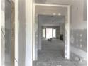 Spacious living room featuring an open floor plan, and sliding doors to the backyard at 19028 Newburg Hill Rd, Davidson, NC 28036