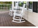 Relaxing porch featuring rocking chairs and a small table, perfect for enjoying the outdoors at 552 Blue Rock Dr, Charlotte, NC 28213