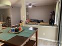 View of the living room from the dining area, showing the open layout and cohesive design at 11106 Harrowfield Rd, Charlotte, NC 28226